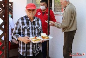 Old man with food