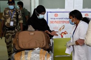 Health workers screen passengers arriving from abroad for monkeypox symptoms at Anna International Airport terminal in Chennai, Tamil Nadu, India on 3 June 2022